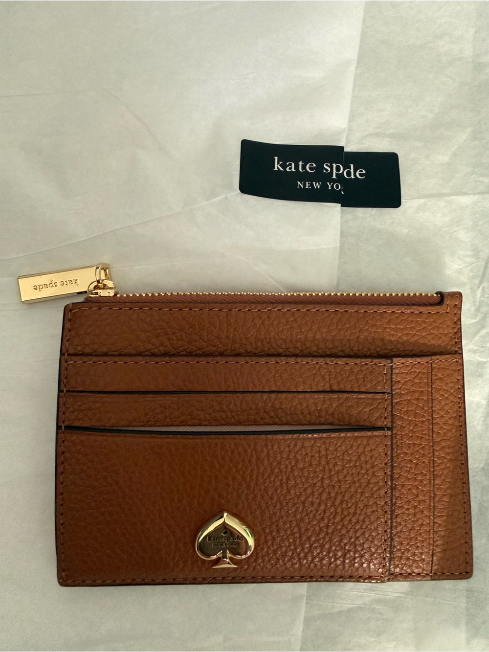 kate spade Tan Pebble Leather Card Case with Gold Spade Emblem